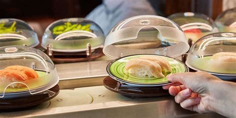 Sushi revolving bar - Jan. 18, 2024; Columbus, Ohio, USA; Kura Revolving Sushi Bar is a new restaurant at Polaris. Food is served via conveyor belts and robots and is priced by the plate.